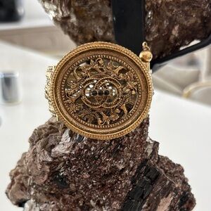 CHANEL Gold-Tone Ornate Round Pendant